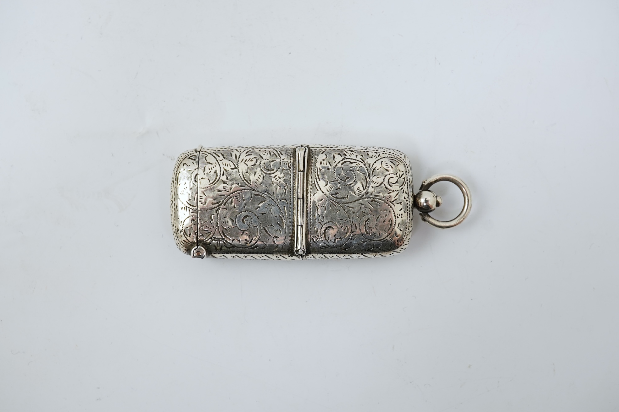 A late Victorian engraved silver oval combination sovereign and vesta case, by W H Tandy & Sons